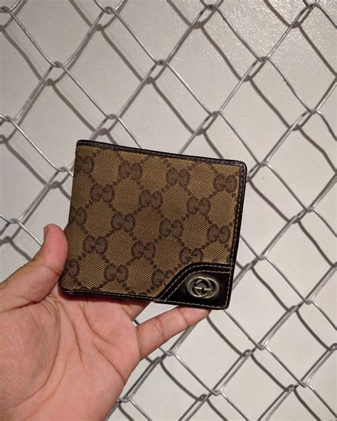 liten right here little mama we are making bills gucci|GG Emblem mini wallet in taupe leather .